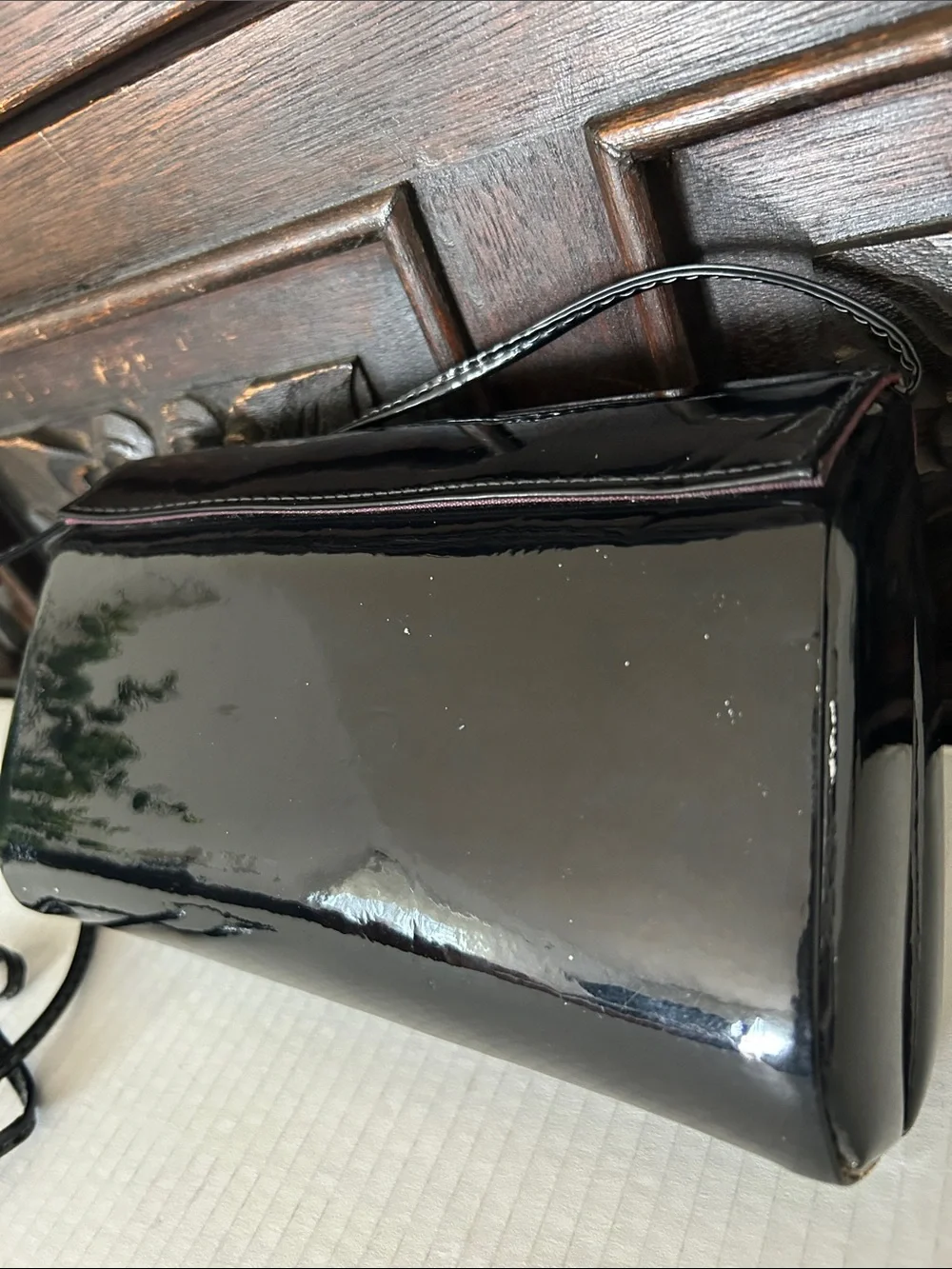 Ande Sleek Black Patent Crossbody with Gold Accent